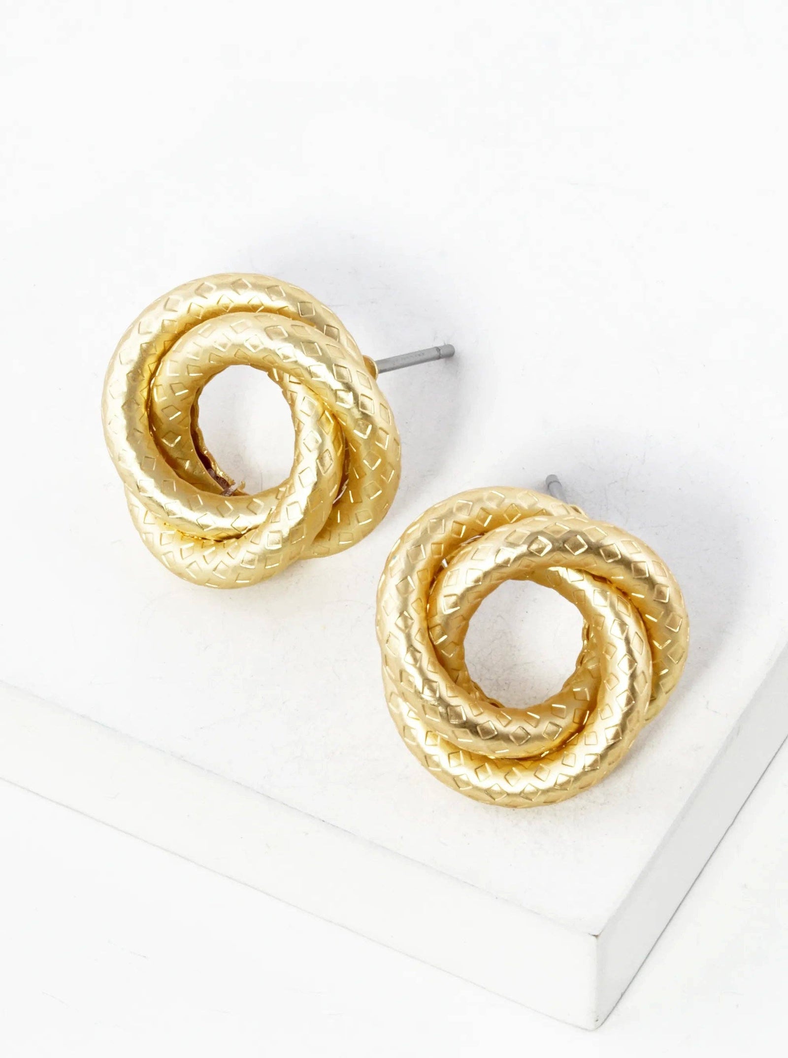 Metal Textured Love Knot Stud Earrings: Matte Gold